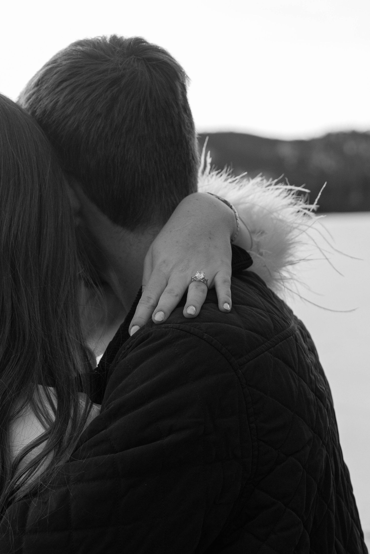 Close-up intimate moments captured in black and white photography.