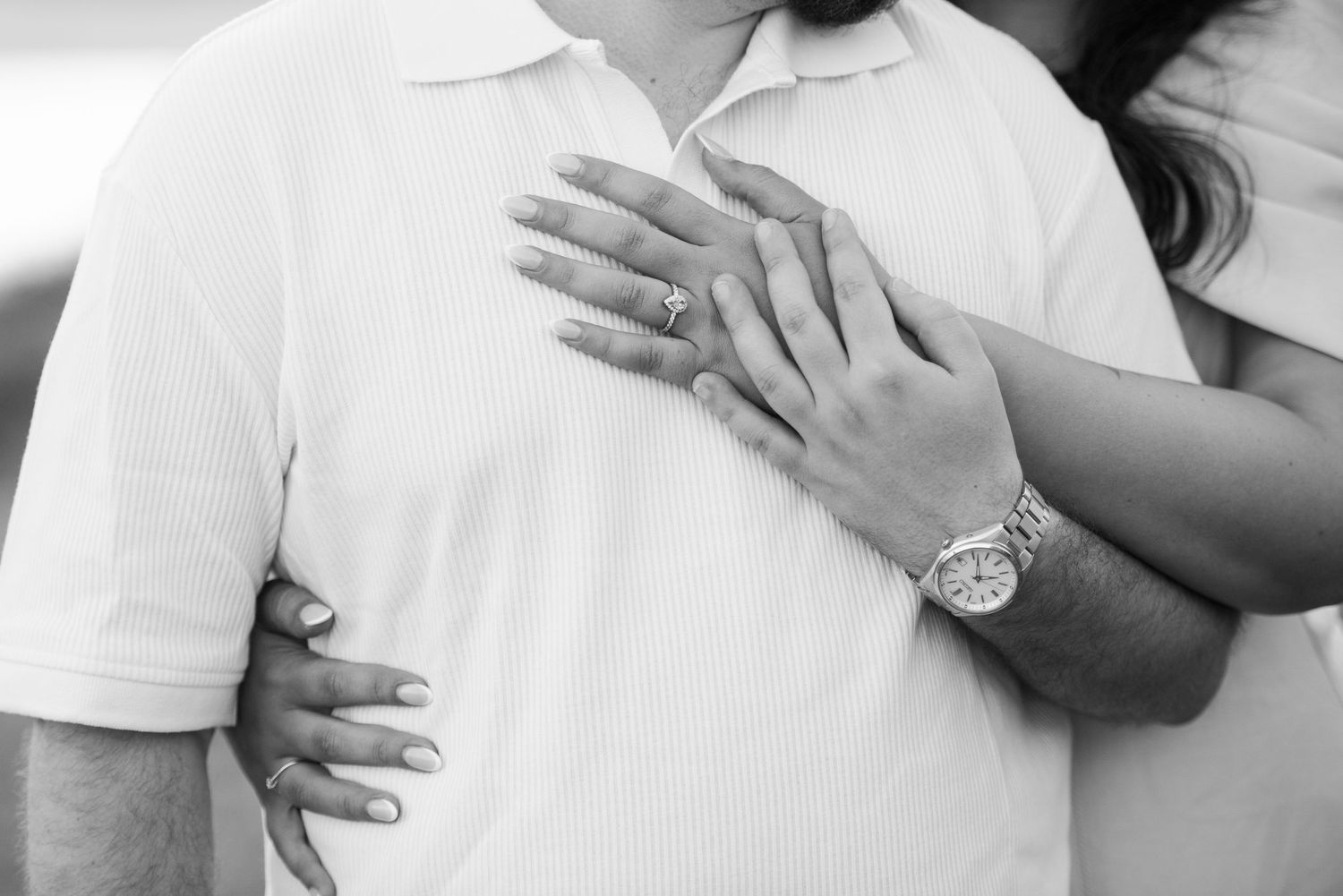 Intimate close-up shots capturing tender moments in white attire.