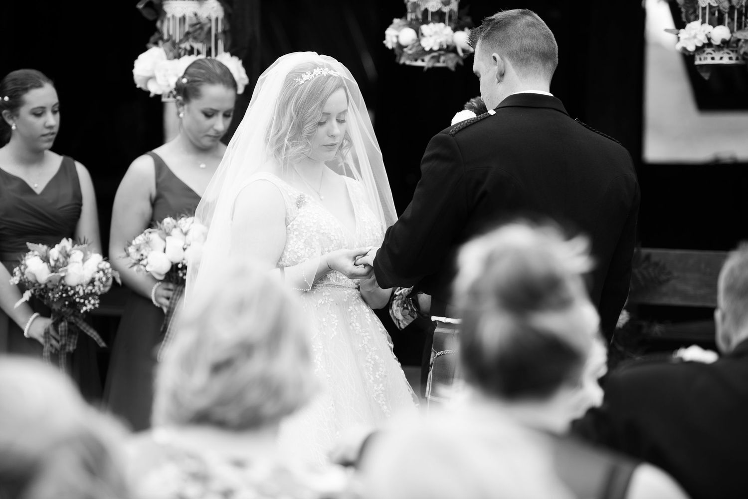 Black and white candid shots of wedding ceremony moments.