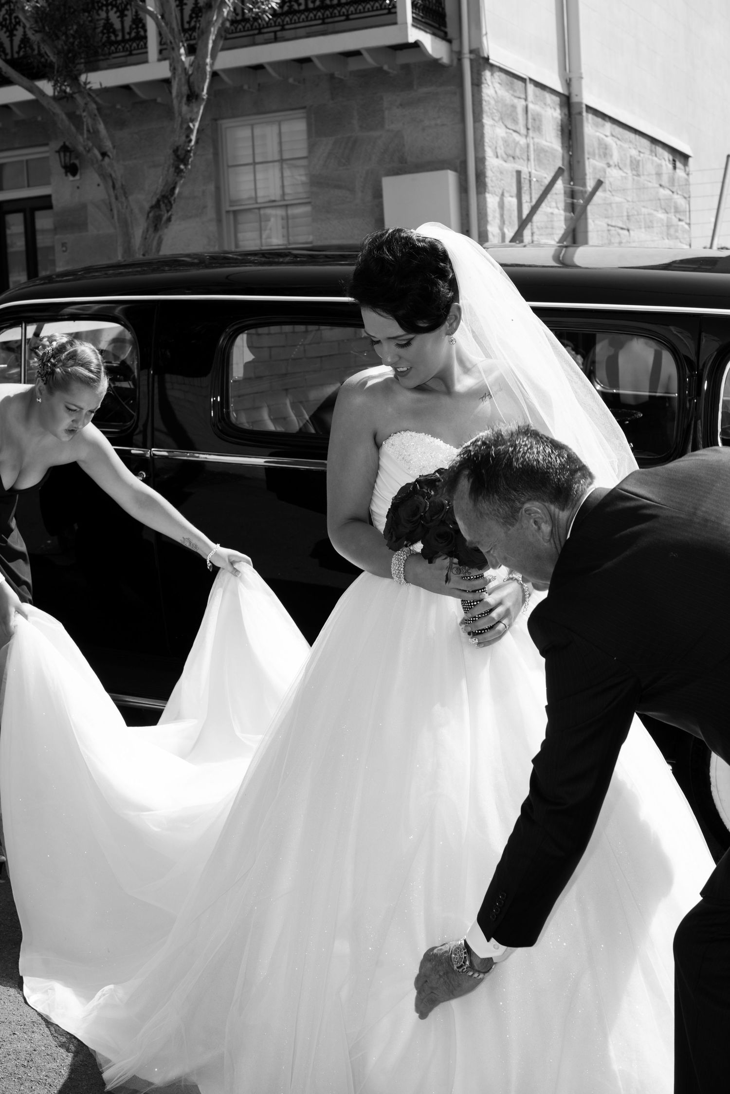 A black and white photo sequence shows a bride in a flowing white dress getting out of the car before the wedding ceremony.