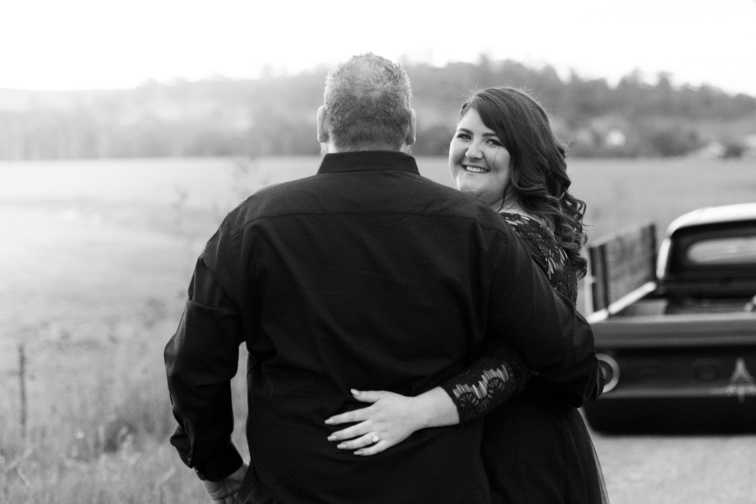 A black and white photo montage shows silhouettes of couples embracing in romantic outdoor settings.