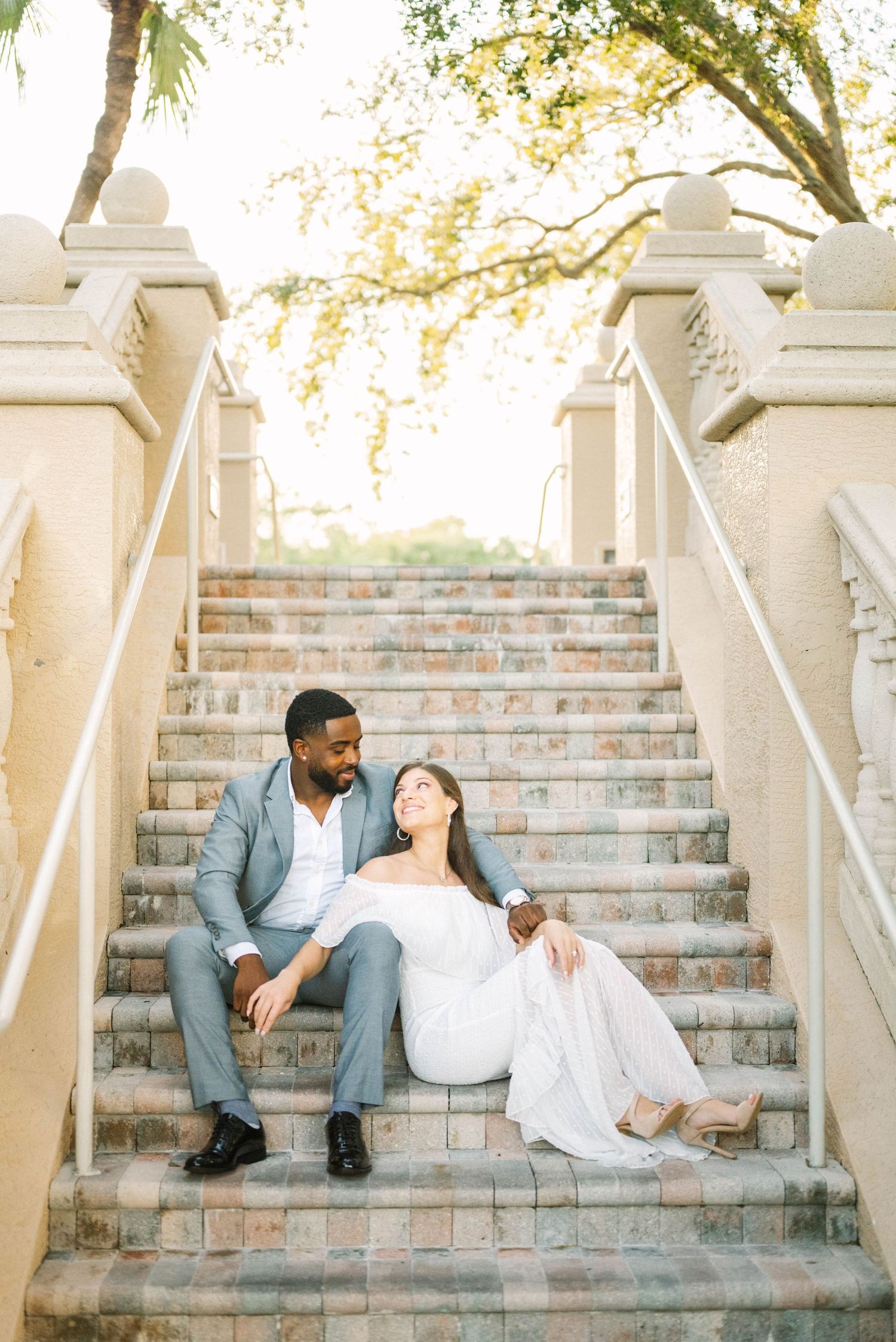 Engagement session in Naples, FL with soft golden light.
