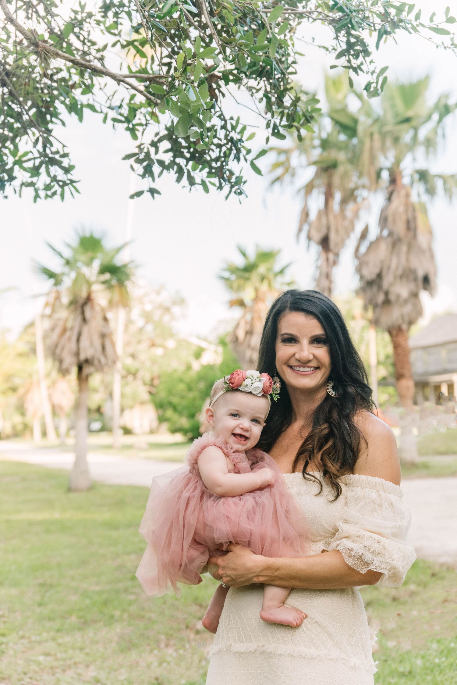 Lifestyle family portrait at Koreshan State Park with soft golden light.
