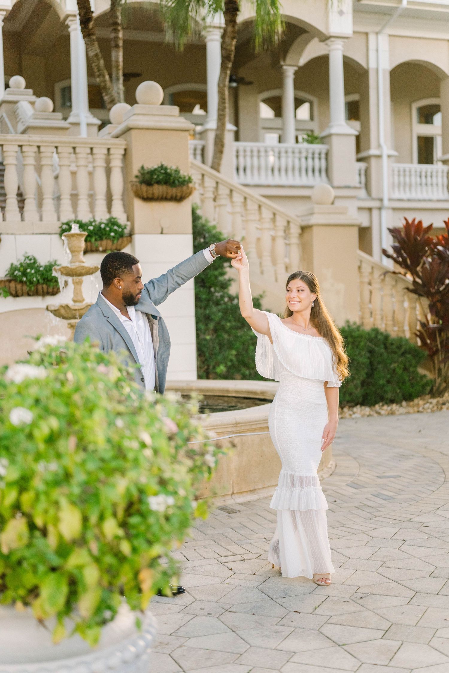 Engagement session in Naples, FL with soft golden light.