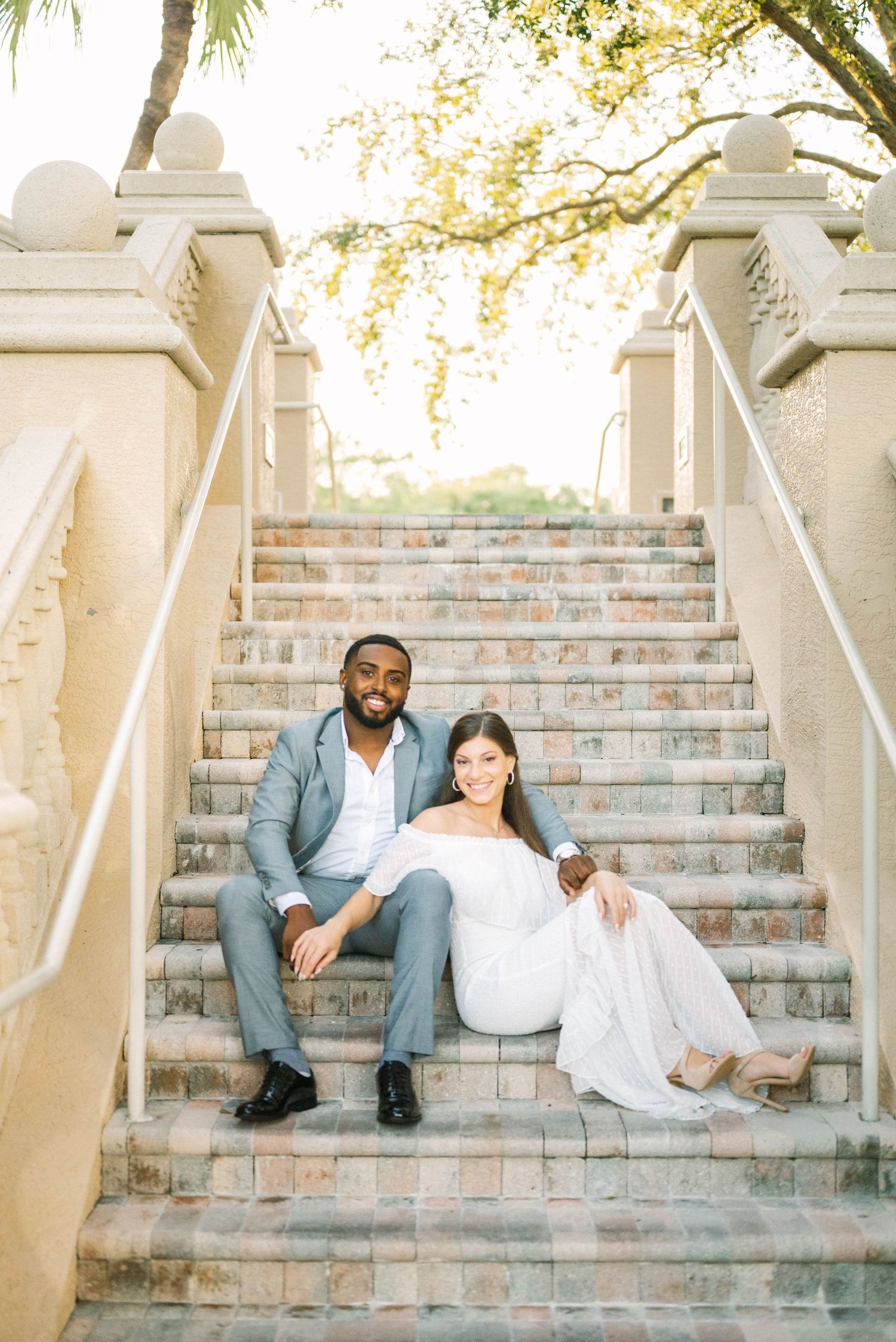 Modern outdoor couple’s portrait with warm evening light.
