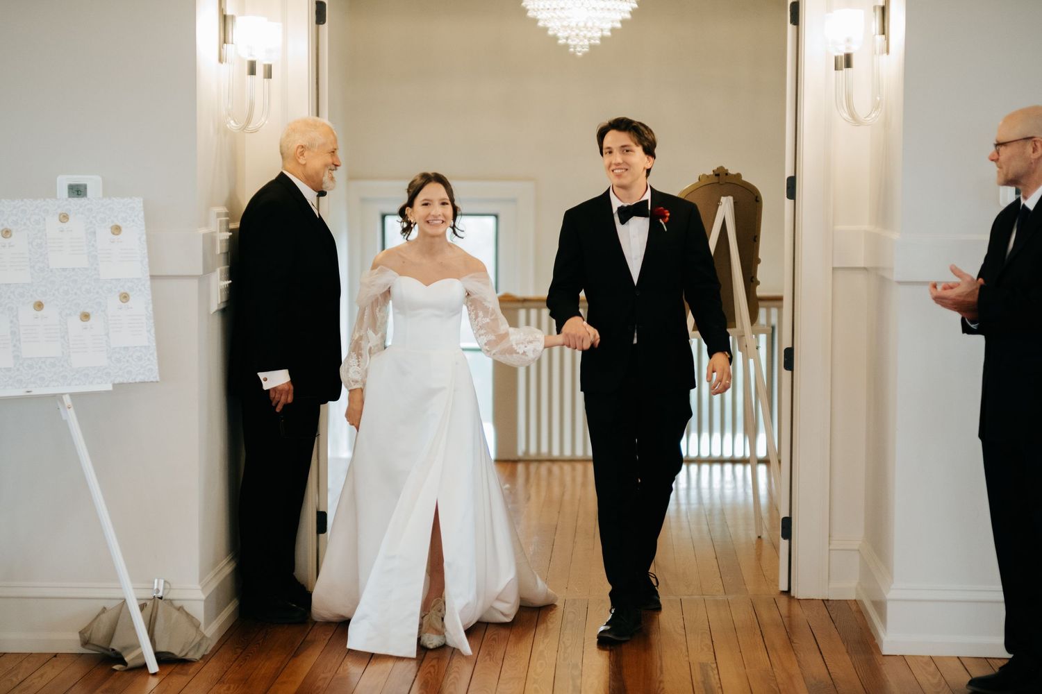 A sequence of wedding moments showing a couple dancing and celebrating in an elegant ballroom with crystal chandeliers.