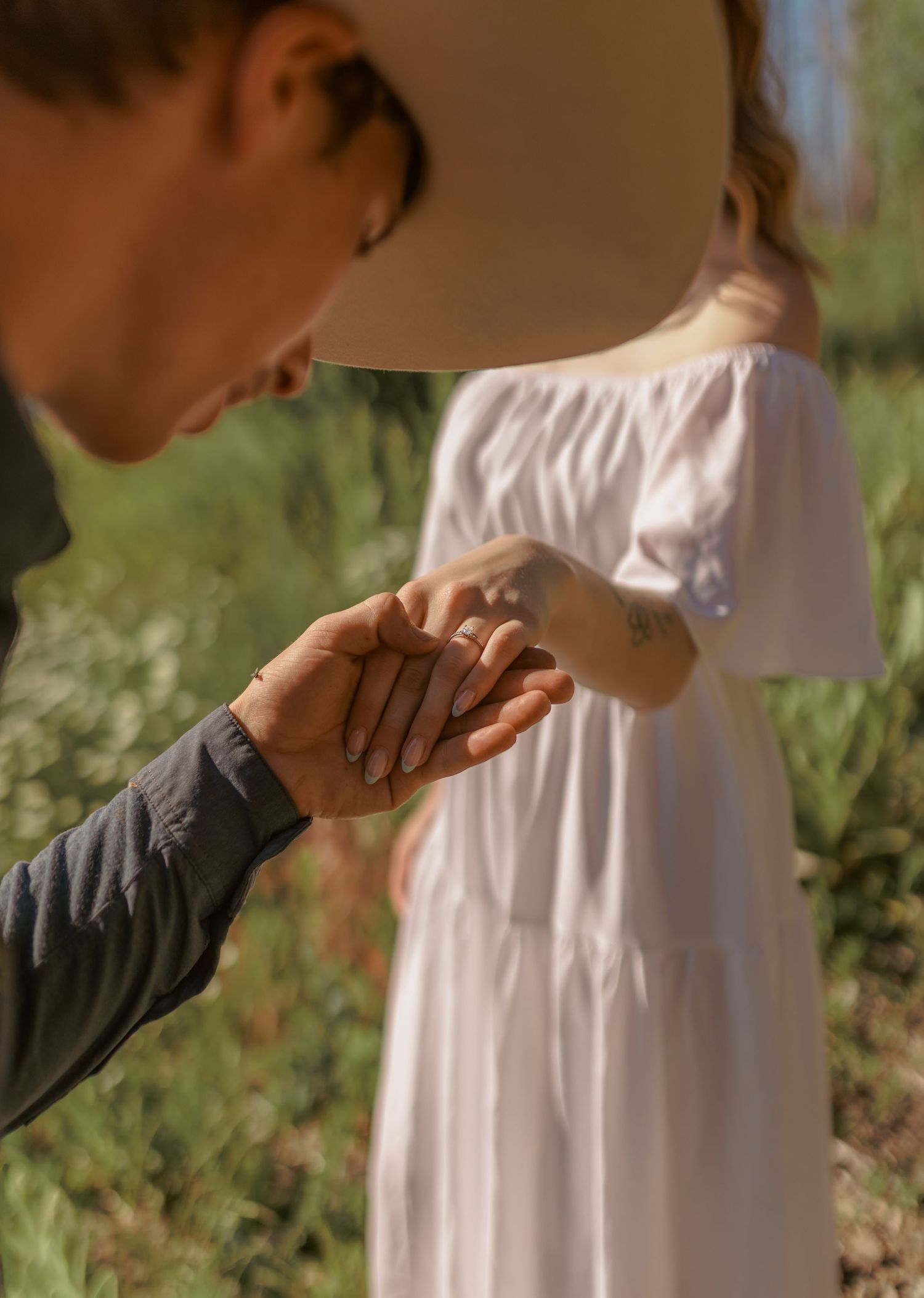 Intimate close-up shots of a couple's gentle interactions in natural lighting.