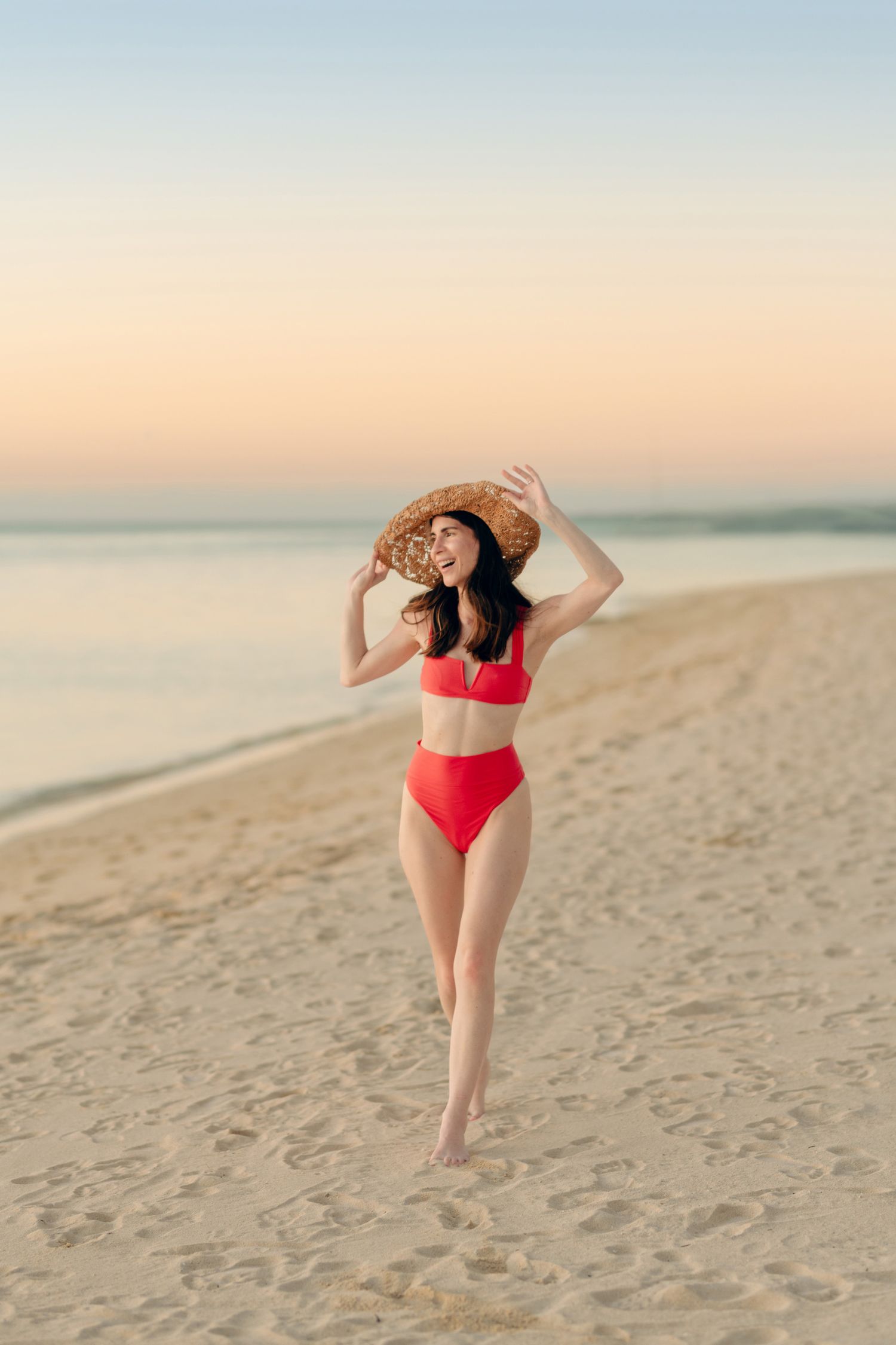 portrait woman hat beach bikini