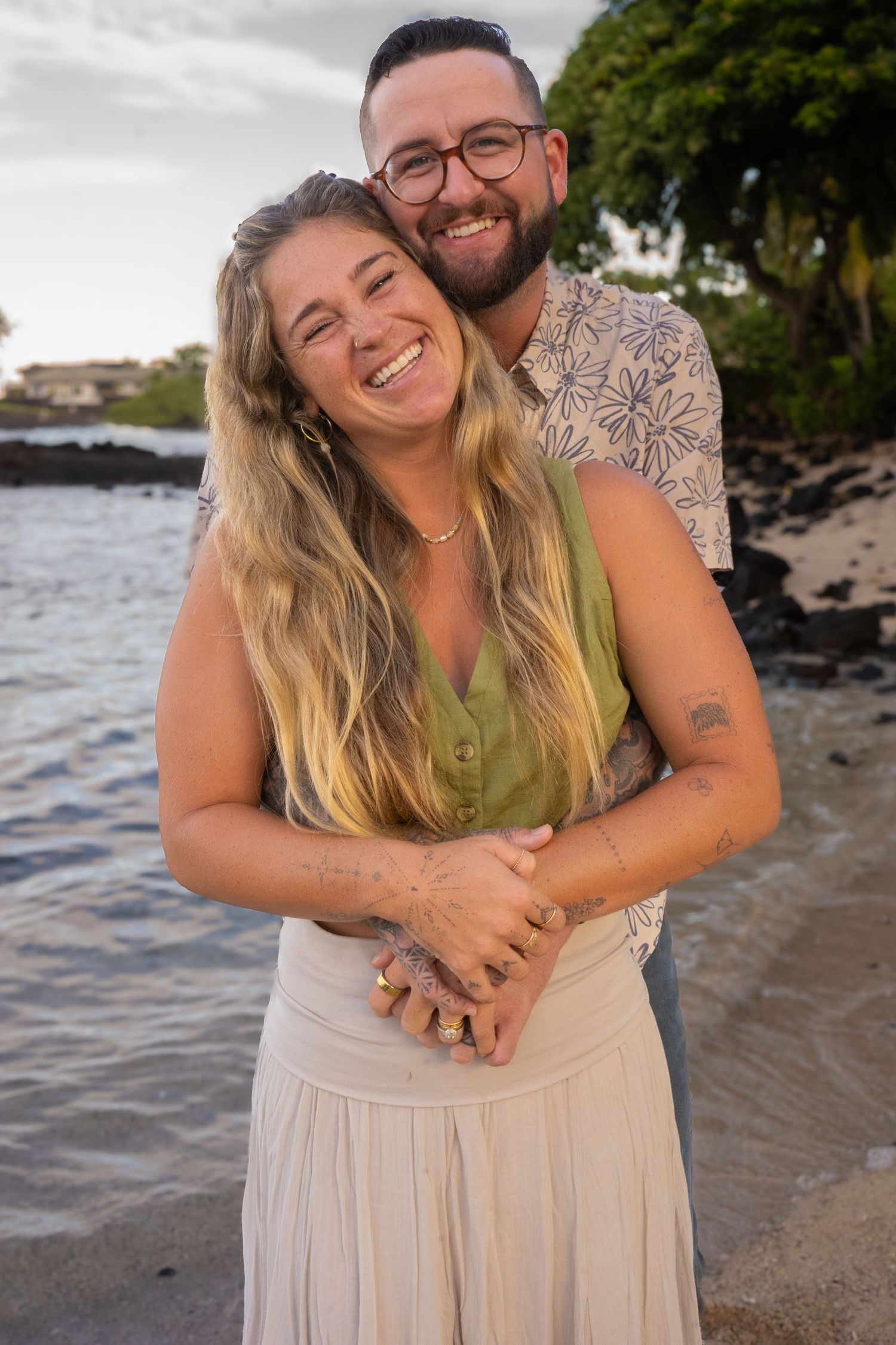 Romantic beach photoshoot sequence showing couple embracing on shoreline at sunset.