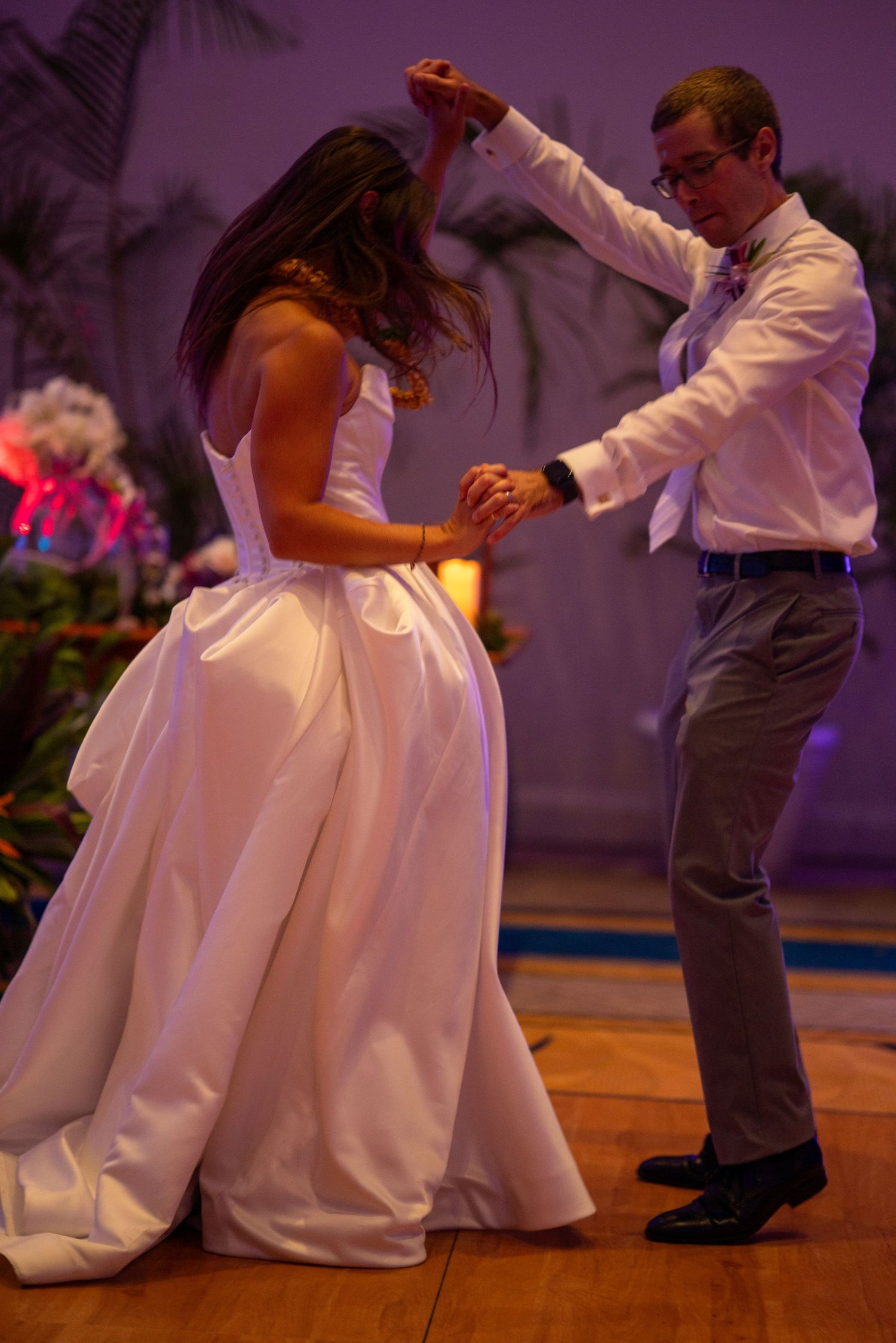 Bride and groom sharing their first dance at wedding reception.