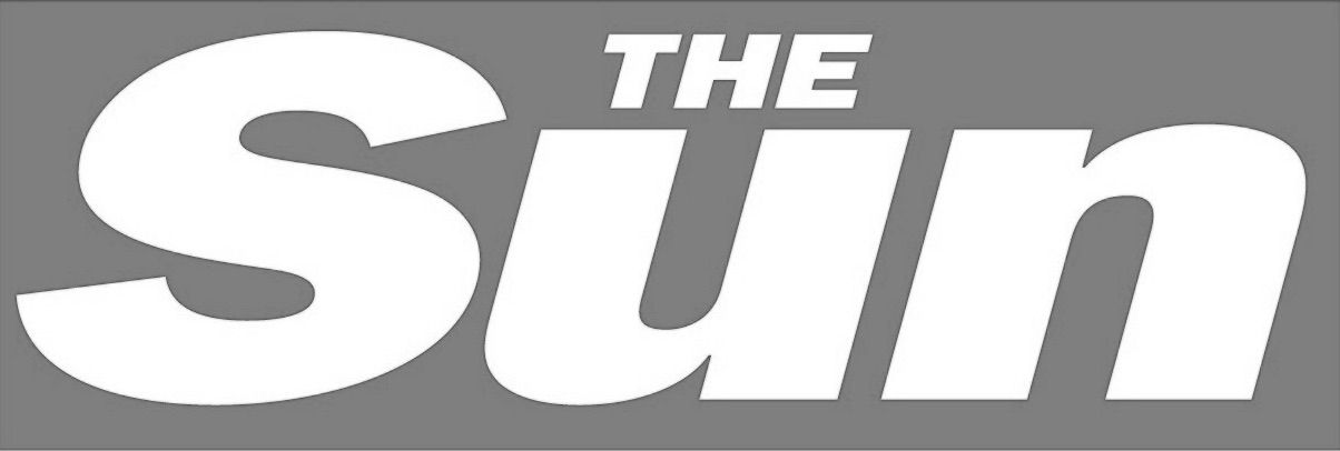 The Sun newspaper logo in black and white against gray background.