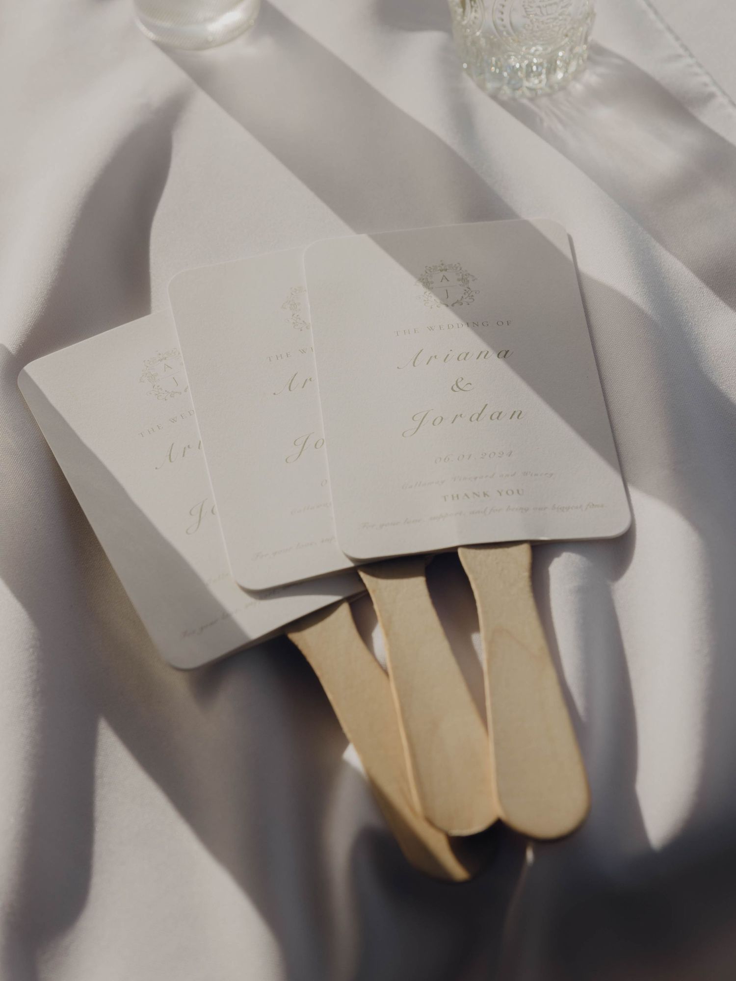 White paper tabi socks with split toe design cast dramatic shadows against a light background.