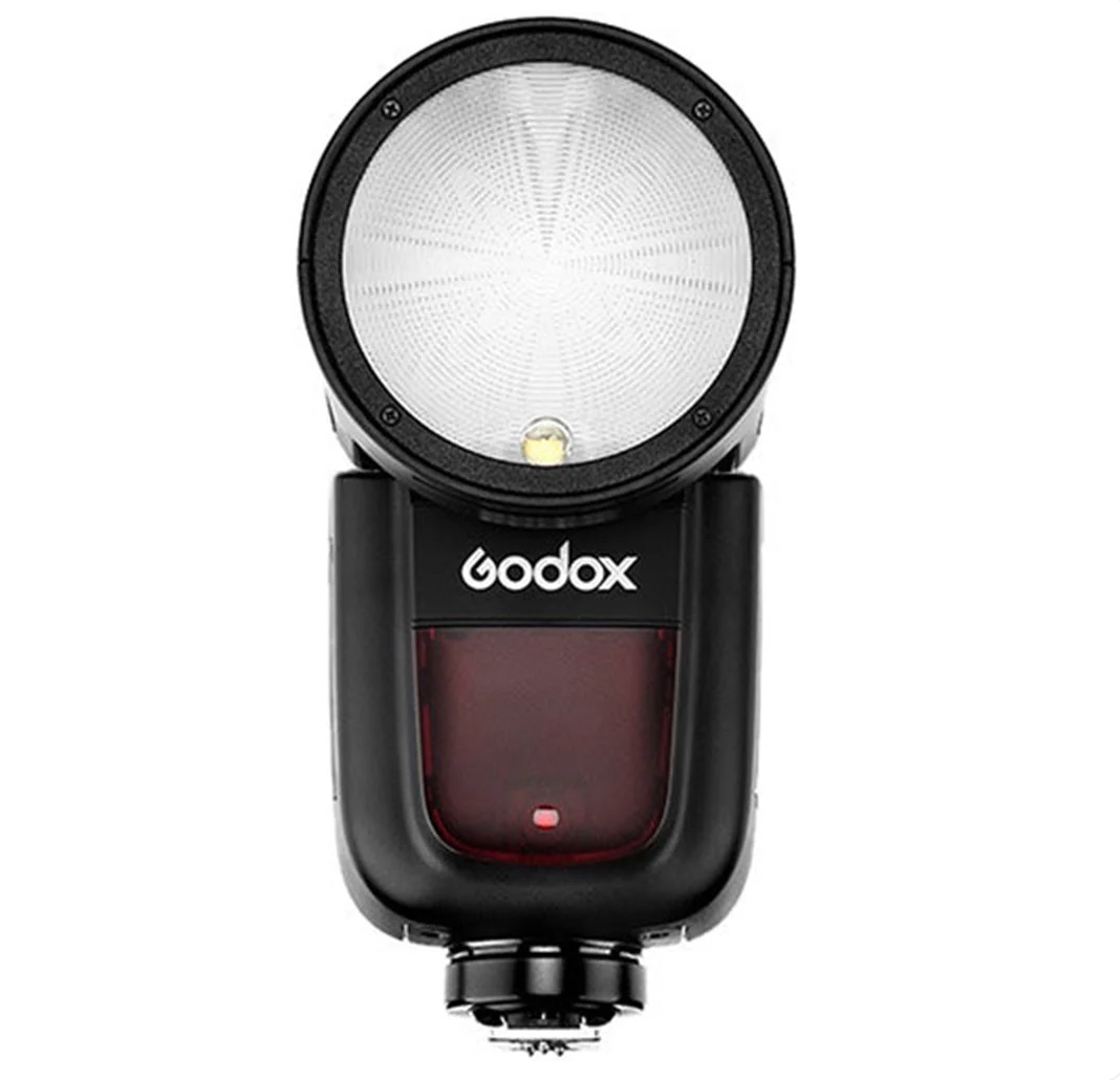 A series of five black camera flash units shown from different angles displaying their light sensors and controls.