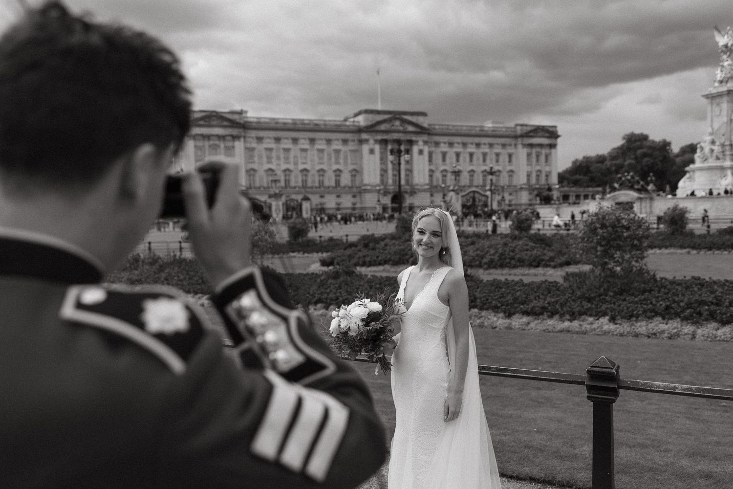 A series of black and white wedding photographs showing elegant outdoor scenes at a stately venue.