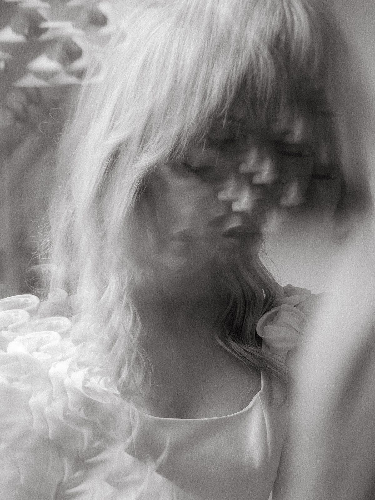 Ethereal black and white portrait sequence showing soft motion blur and dreamy overlapping exposures.
