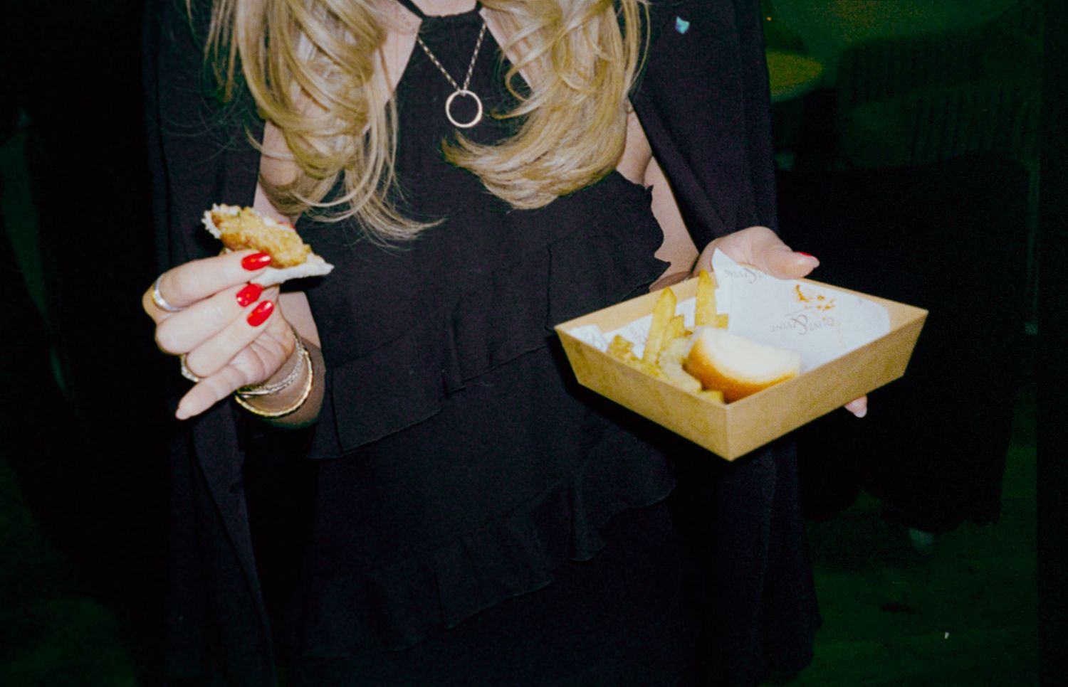 A series of photos showing someone reading a book in dim lighting with blonde hair visible.