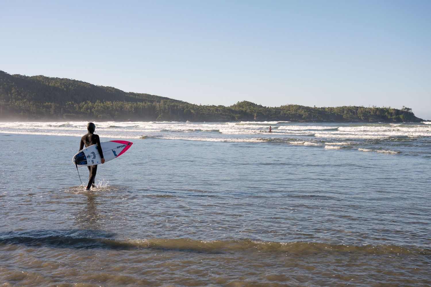 Series of surfing action shots showing silhouettes against ocean waves and coastal scenery.