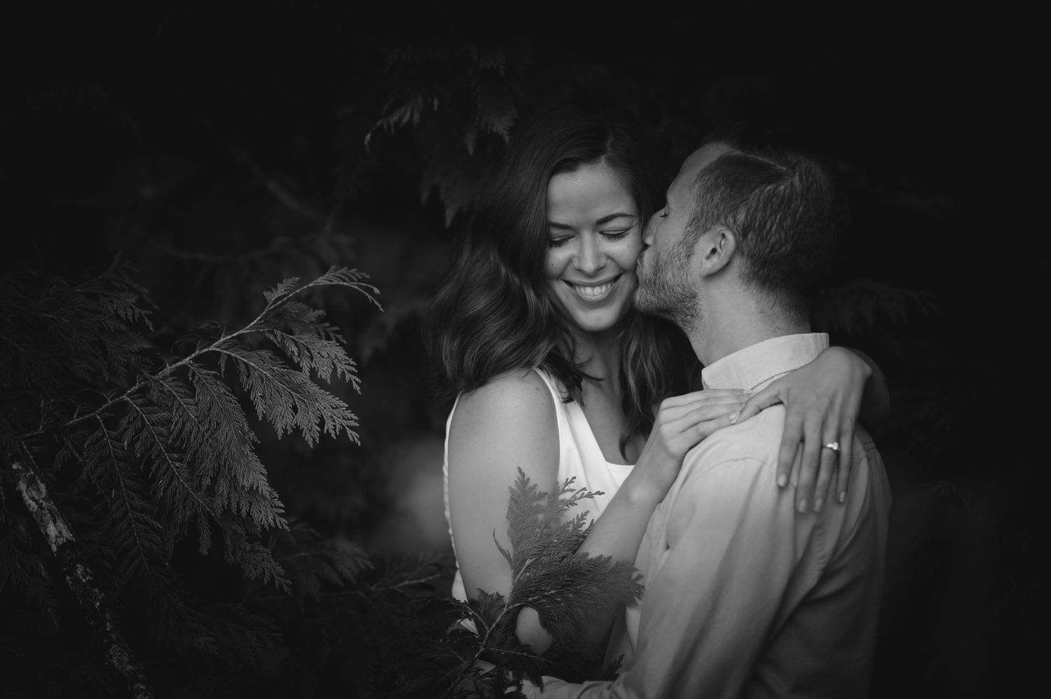 Intimate candlelit moments captured during an evening wedding celebration.