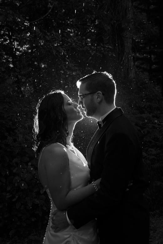 Dramatic black and white silhouettes of romantic moments in forest setting.