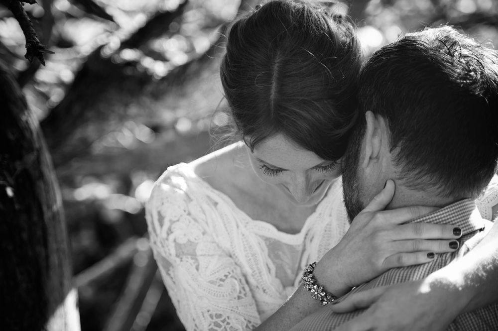 Intimate black and white wedding photography moments in natural light.