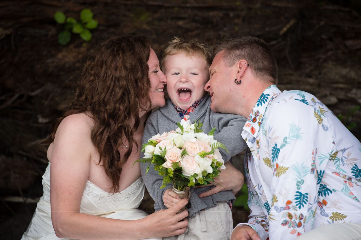 Candid wedding moments captured in a natural outdoor setting with floral details.