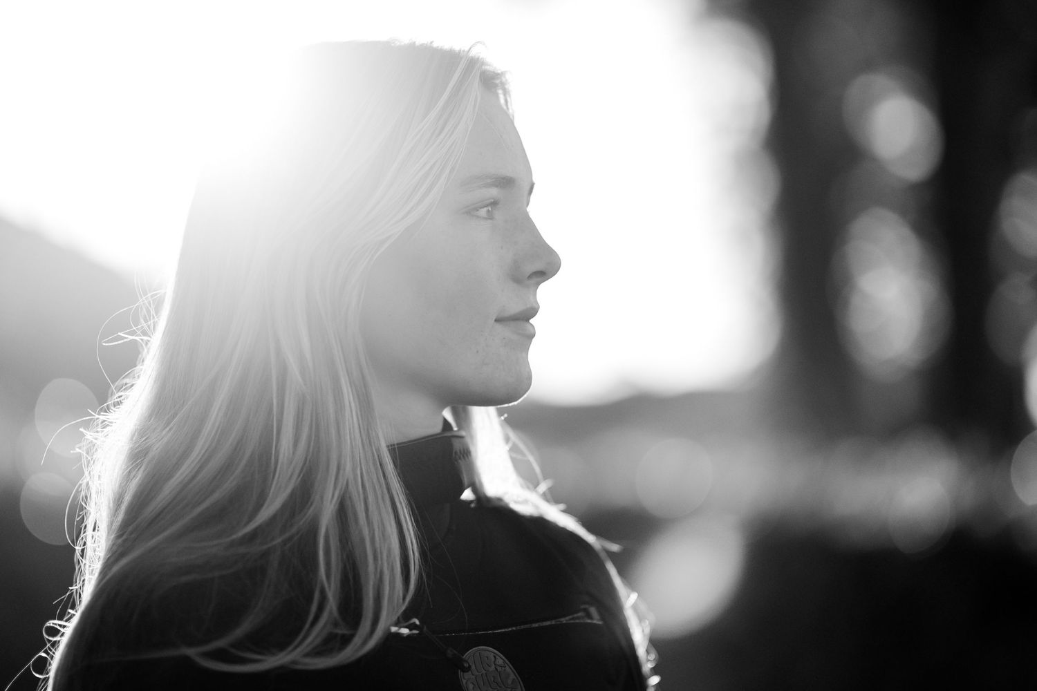 A series of black and white profile silhouettes showing a person with blonde hair in backlit dramatic lighting.