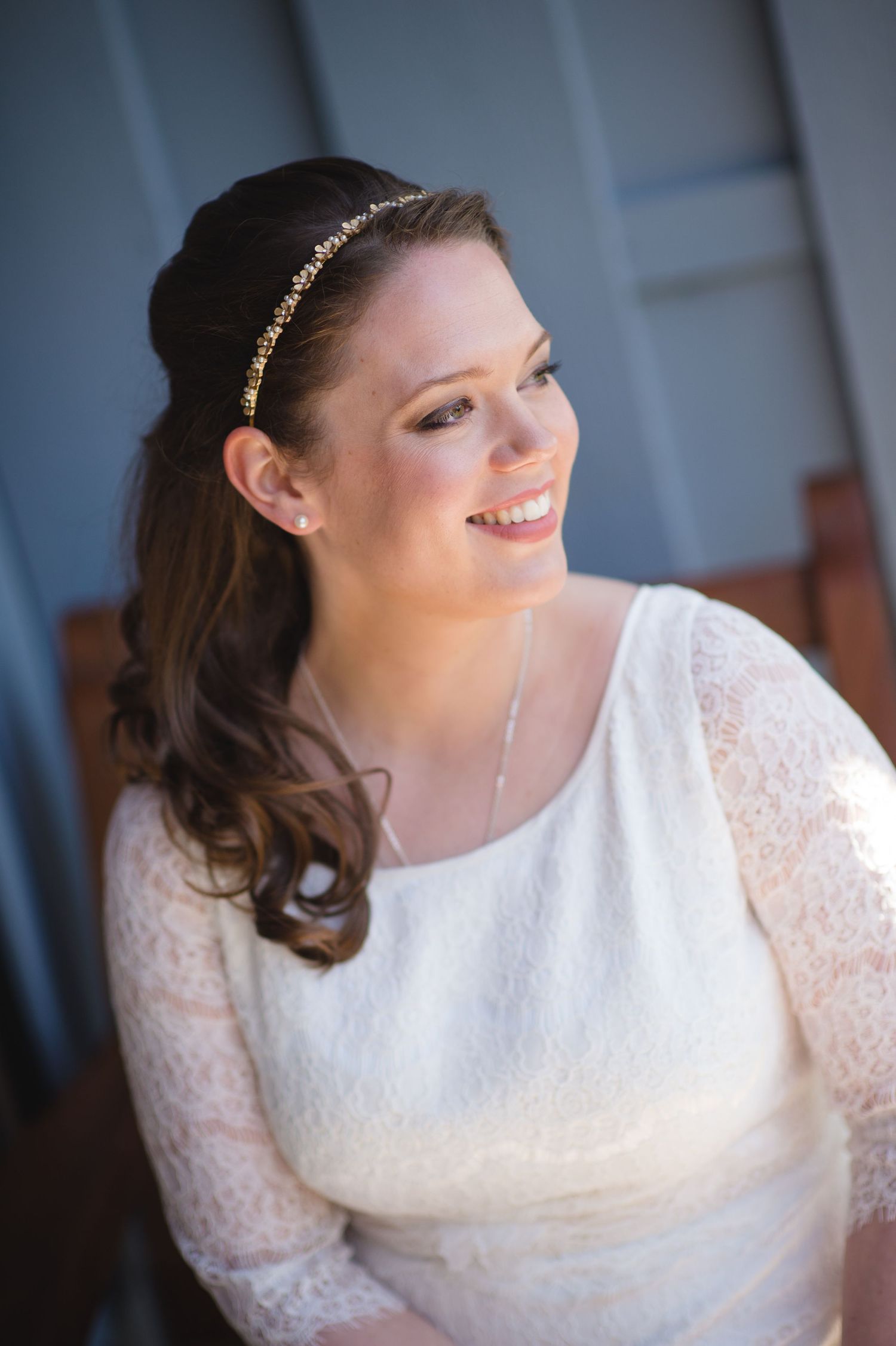 Elegant bridal portraits featuring lace details and a delicate headpiece.