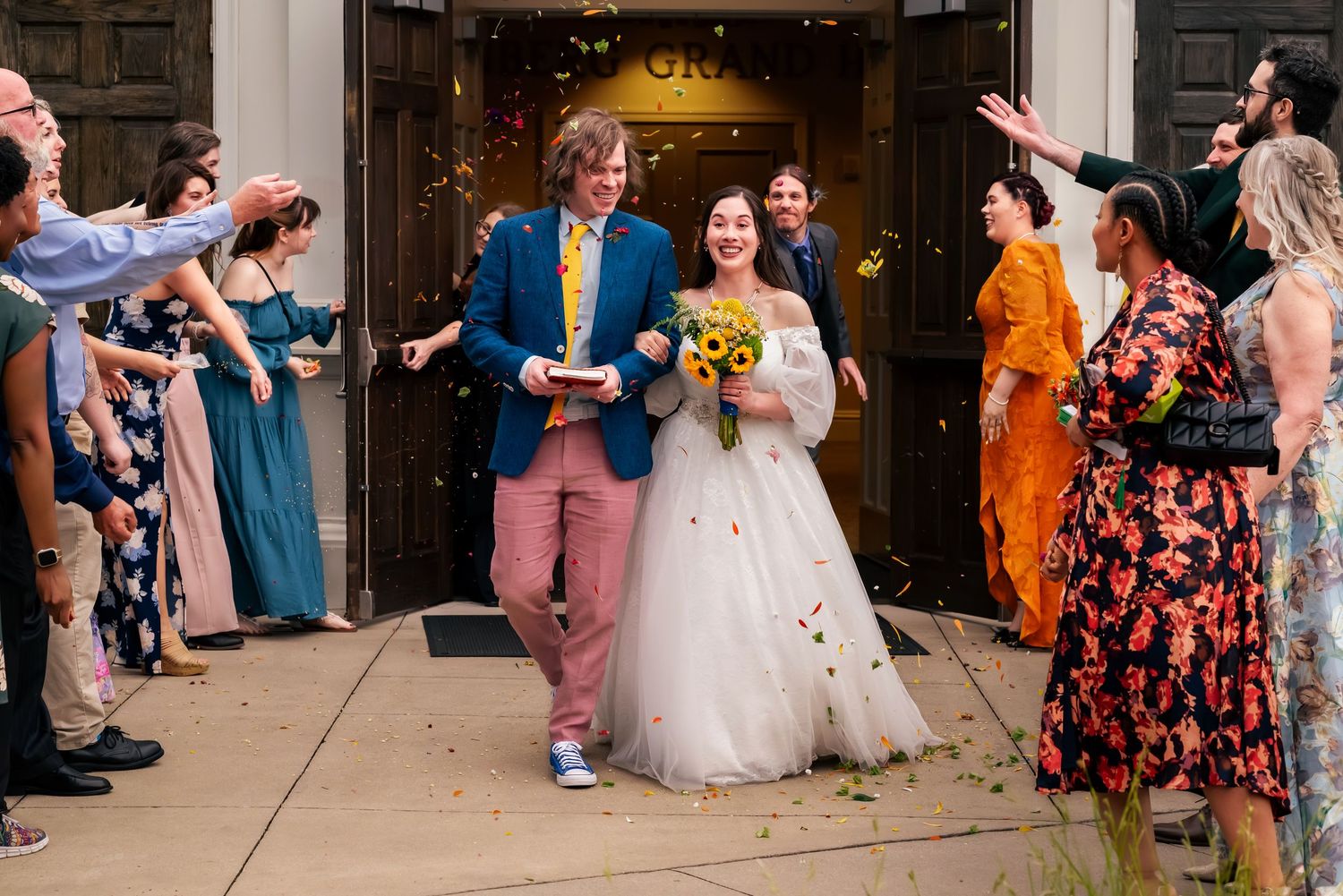 Bride and groom's Grand Exit at a cinematic Botanical Garden wedding in Huntsville, Alabama, captured by Catch Your Fire Photography