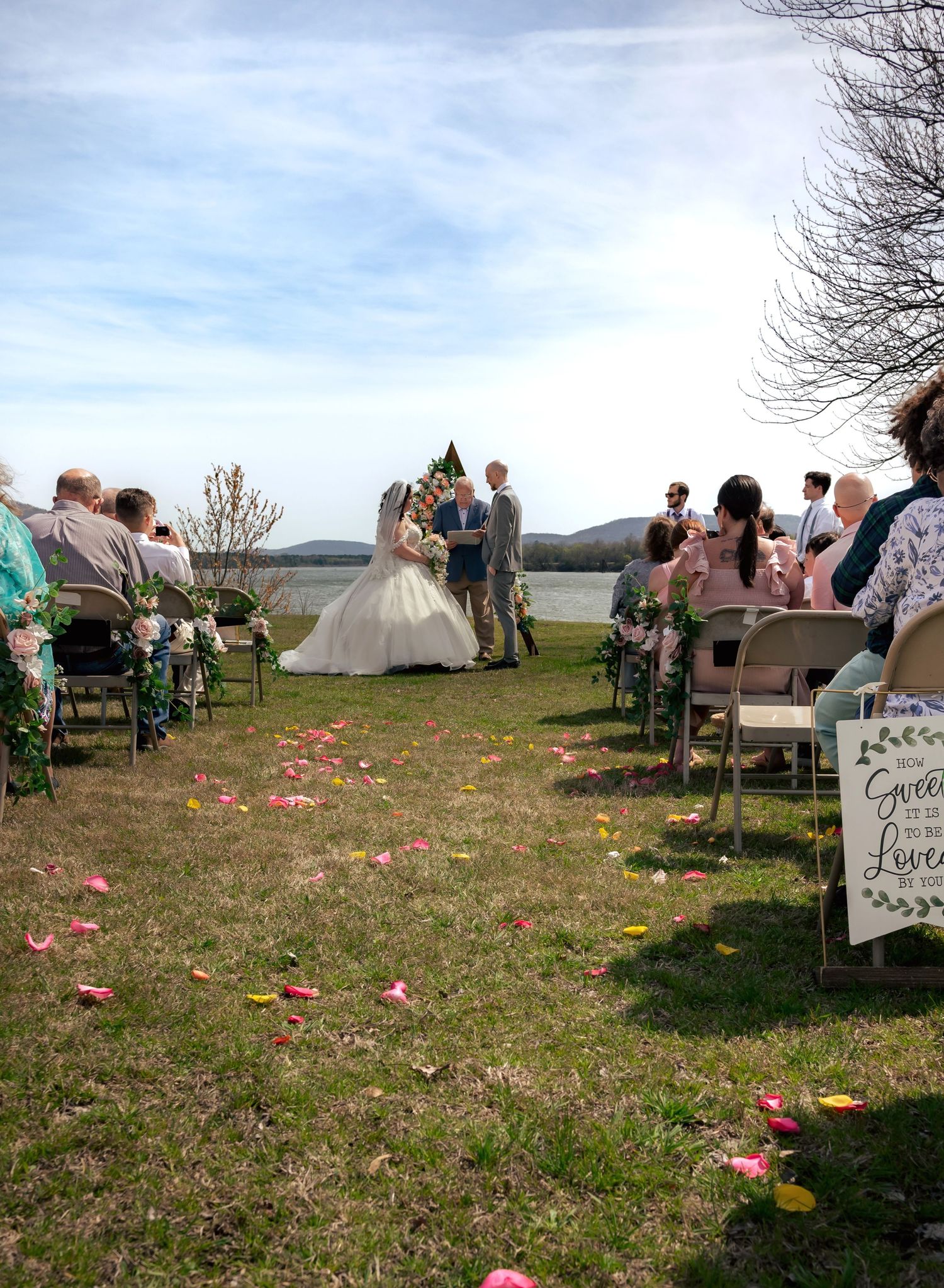 Bright midday wedding ceremony overlooking the Tennessee River at Ditto Landing