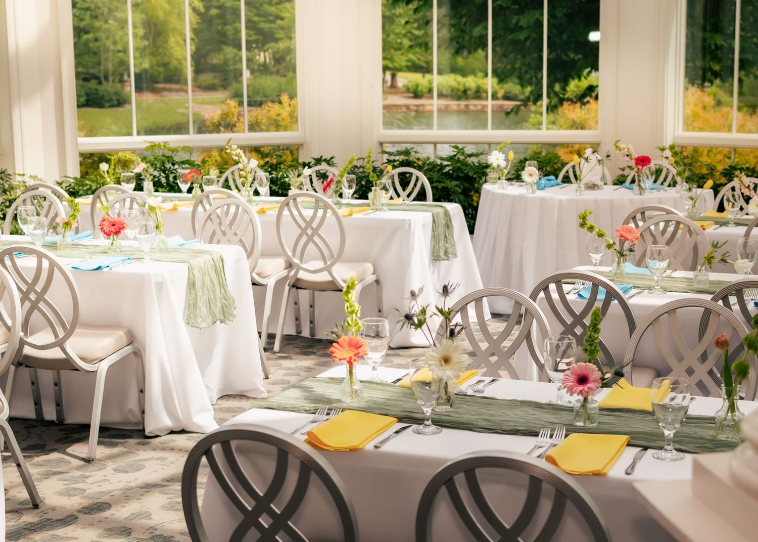 Elegant reception tables inside the Observatory Room at Huntsville Botanical Garden wedding reception