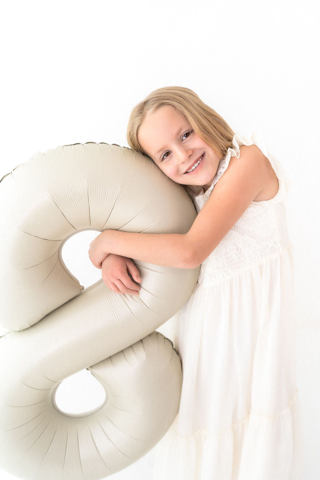 White studio child photography