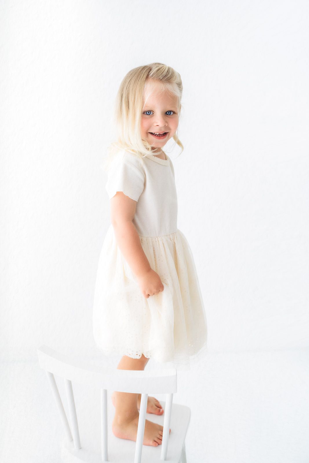 White studio child photography