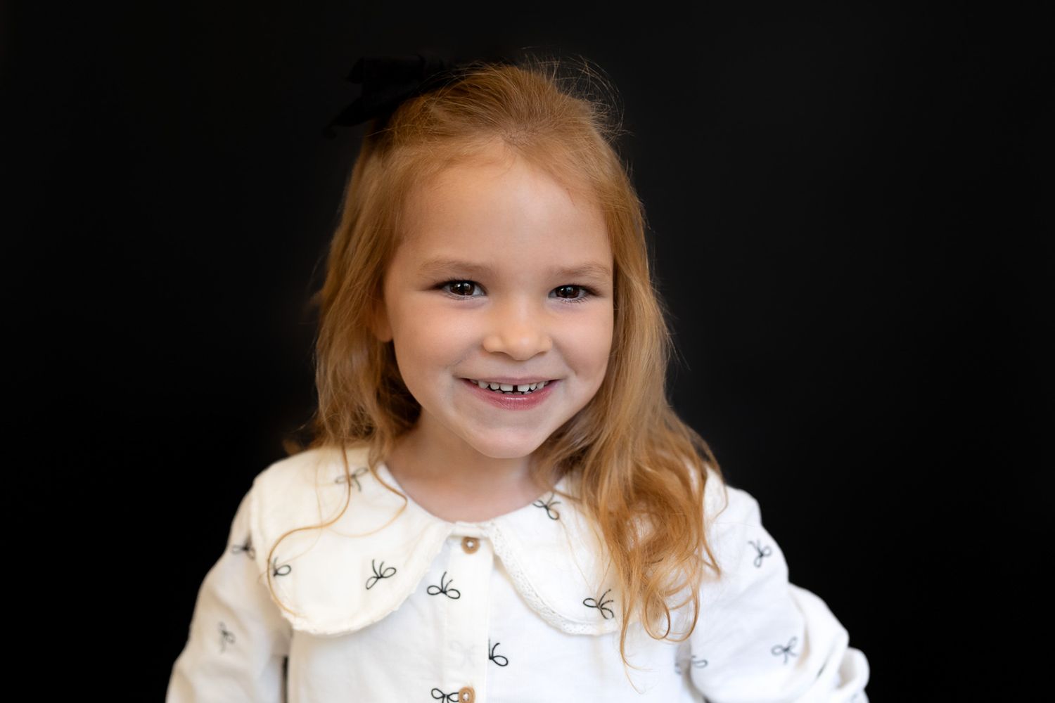 Preschool portraits on black backdrop in Moore County, NC