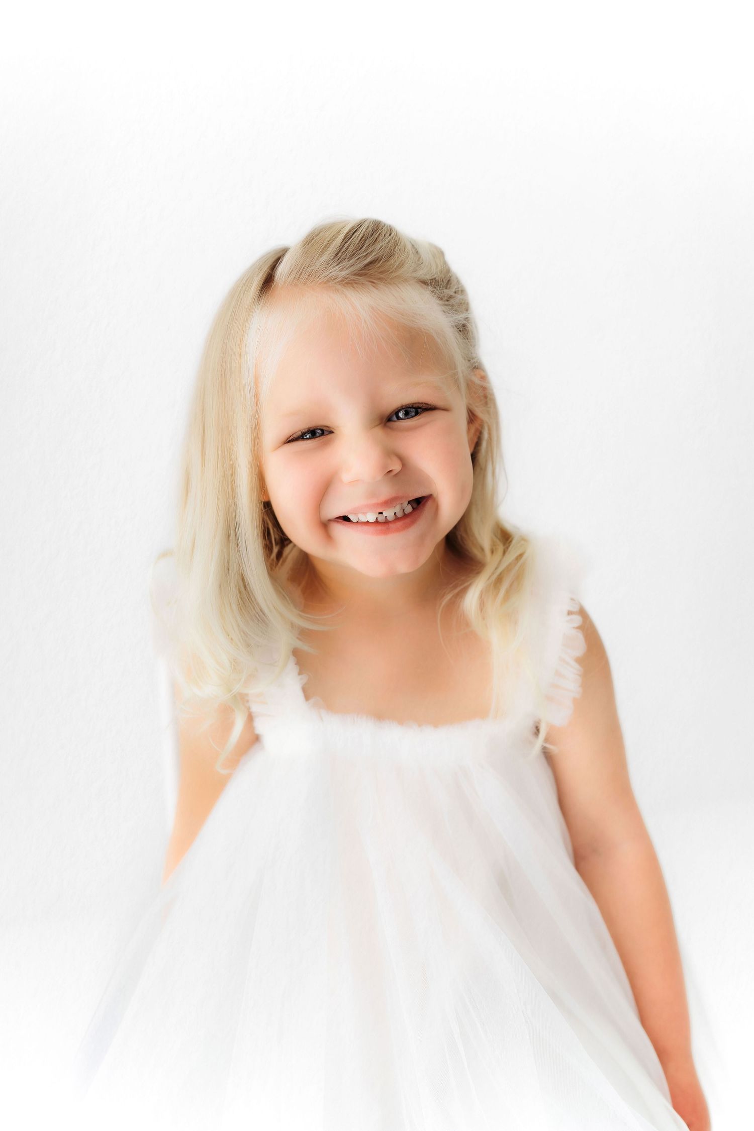 White studio child photography