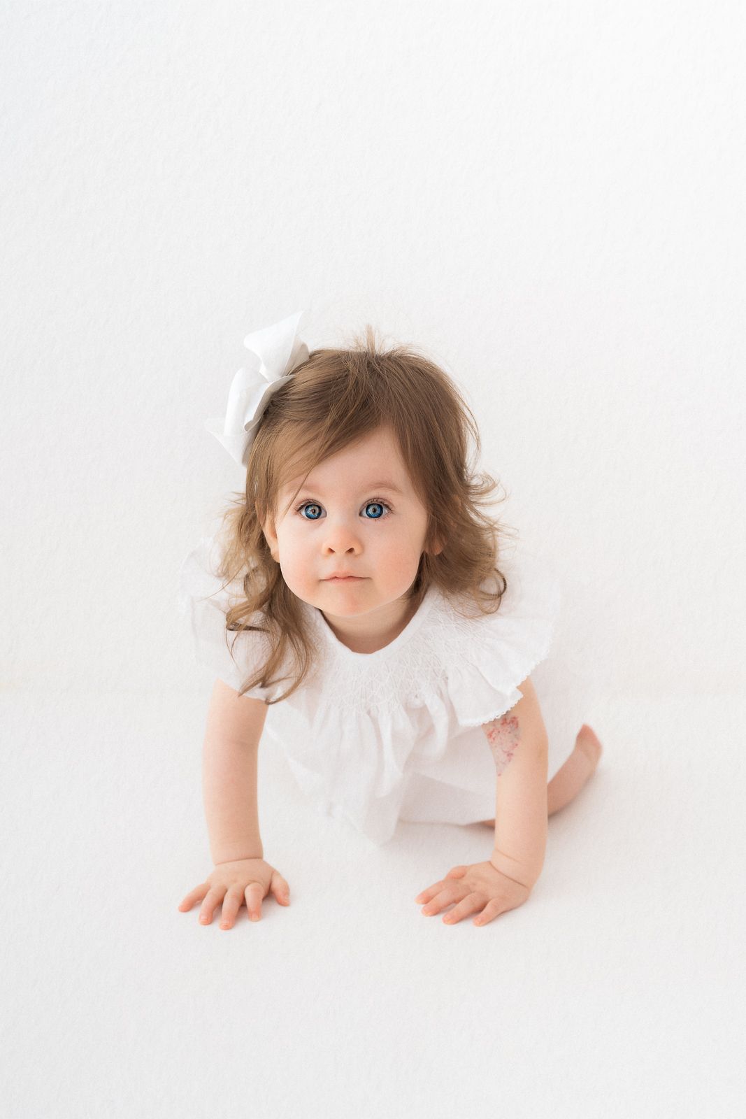 White studio child photography