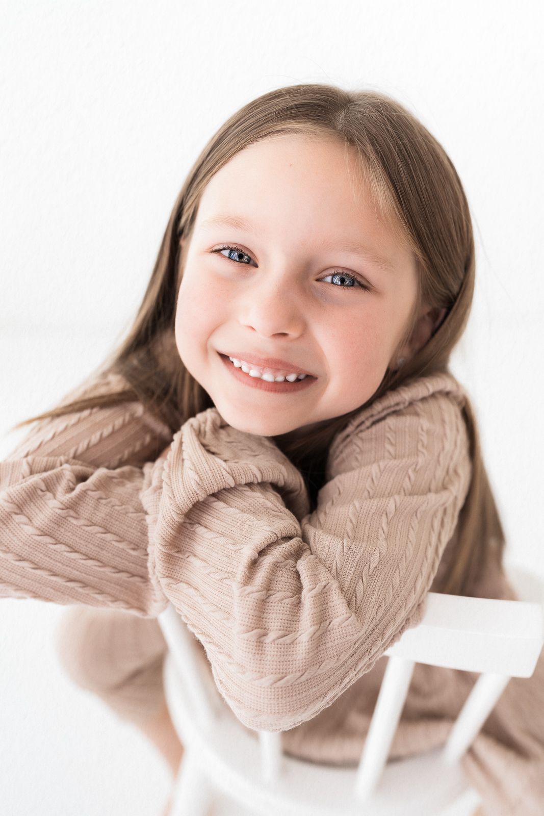 White studio child photography