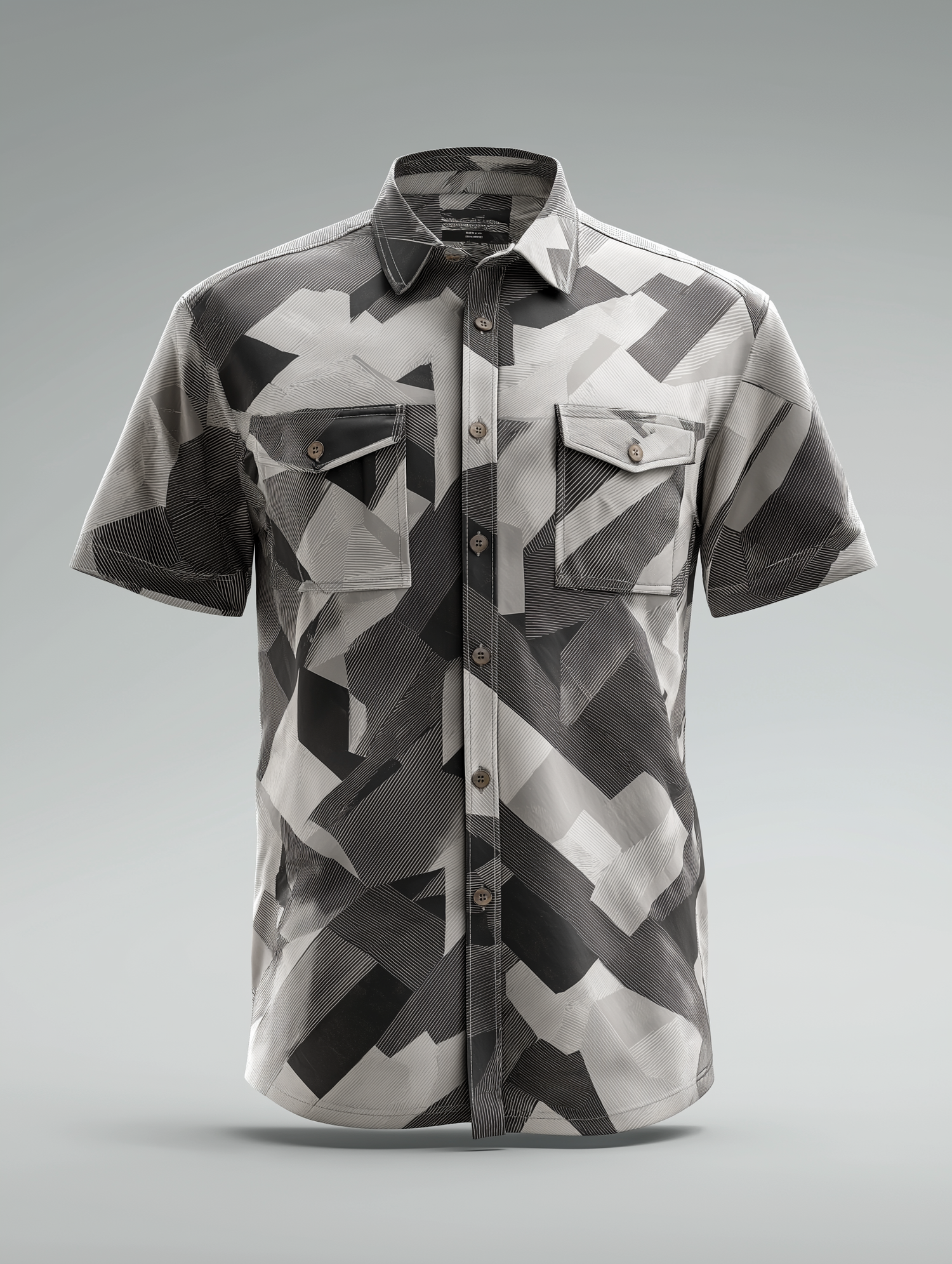 Short-sleeve button-up shirt with geometric gray camouflage pattern and dual chest pockets. Merced Wedding Photographer