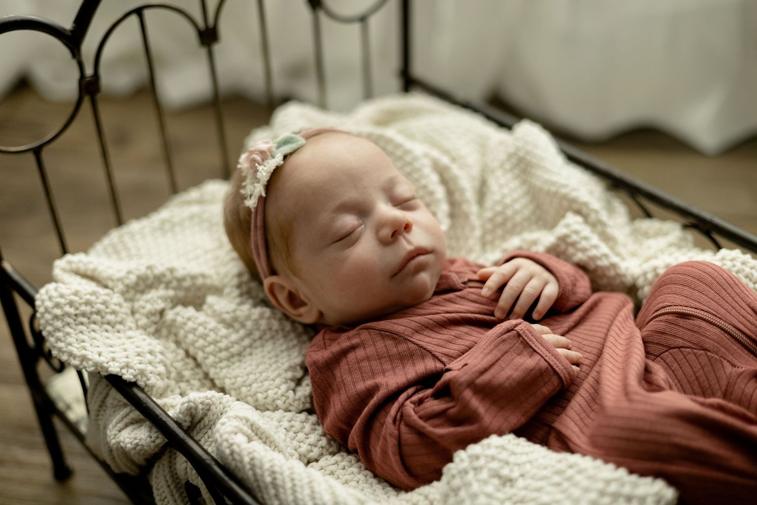 Sleeping newborn in photo taken by Little Buckaroo Portrait Co., an East Texas newborn photographer.