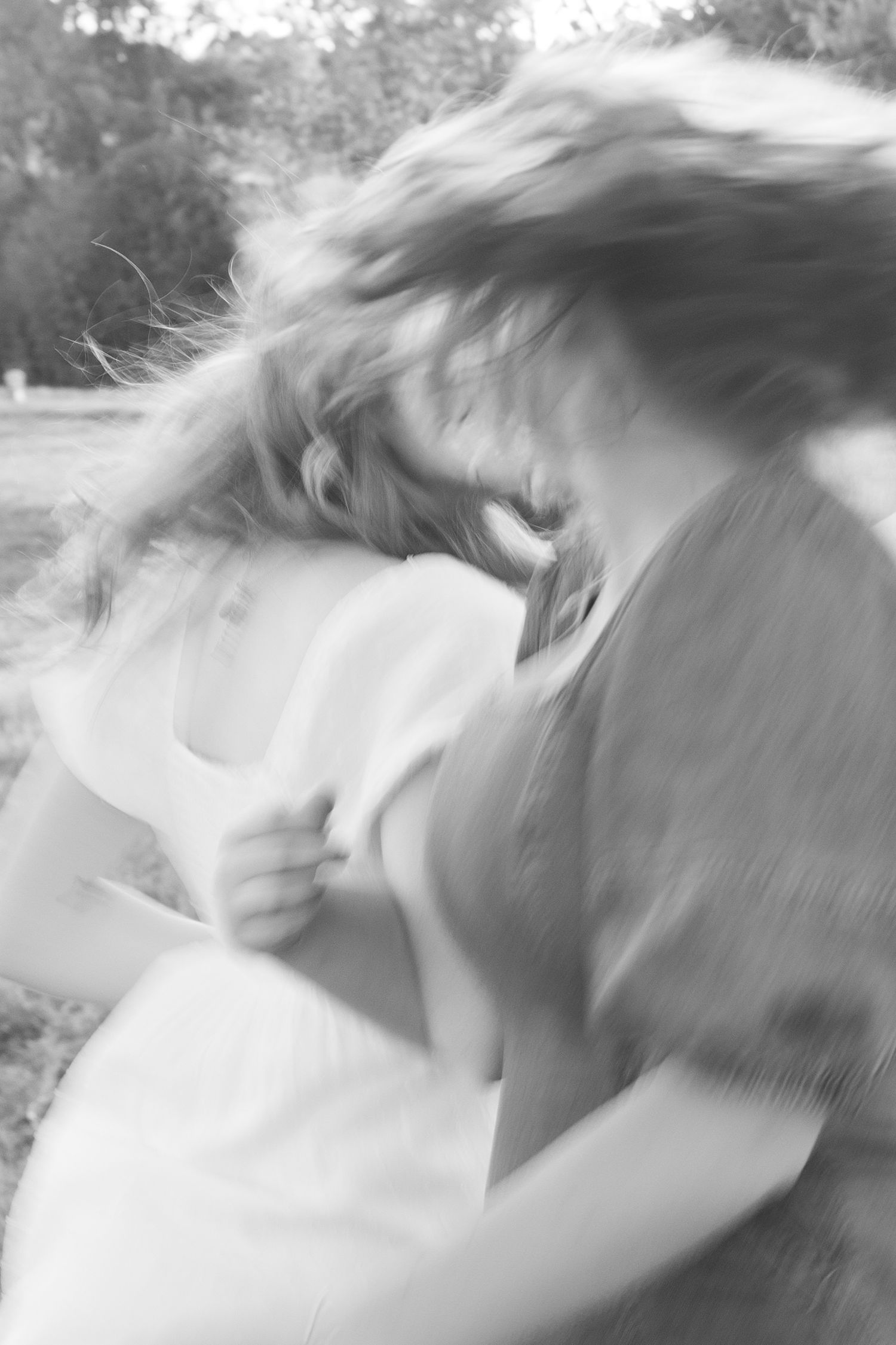 Abstract motion blur portrait in black and white with flowing movement.