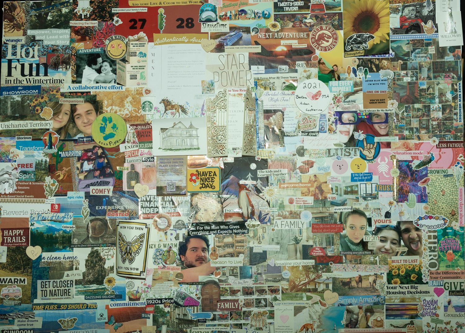 A collage wall filled with various vintage photos, postcards, and memorabilia creating a nostalgic display.