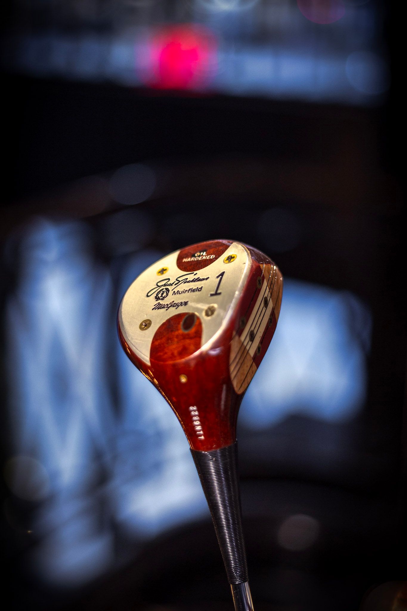 Vintage Jack Nicklaus MacGregor number 1 wood driver golf club head in red and gold finish.