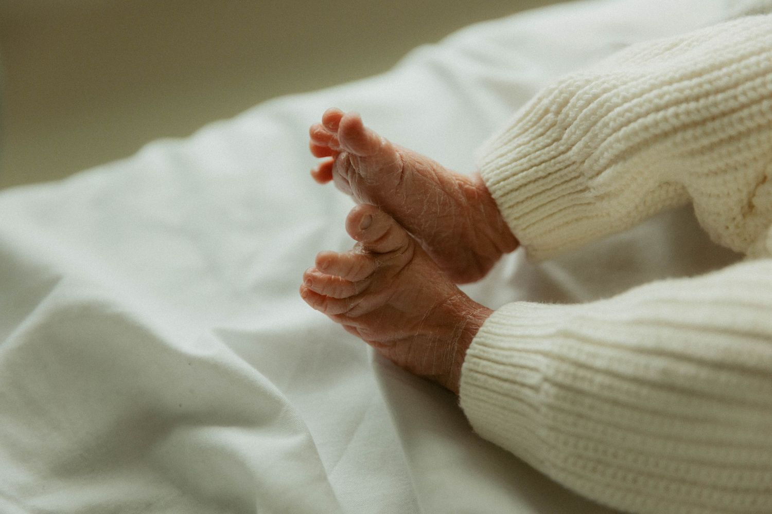 Toronto Fresh 48 newborn photography capturing mother and baby in hospital within first 24 hours after birth