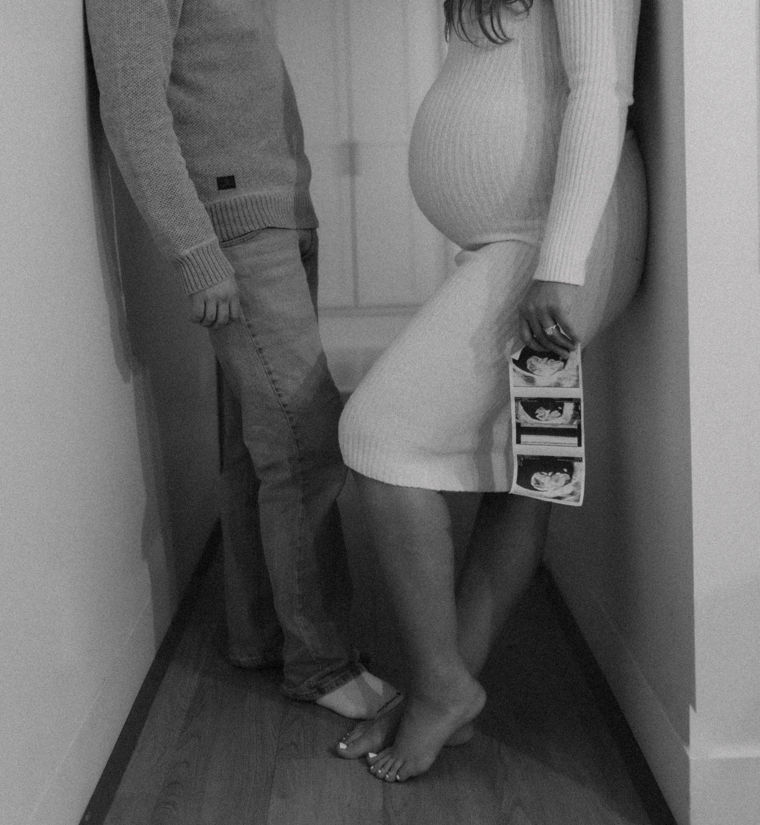 Maternity photography in Woodstock Ontario capturing natural connection, movement, and emotive moments for couples and growing families