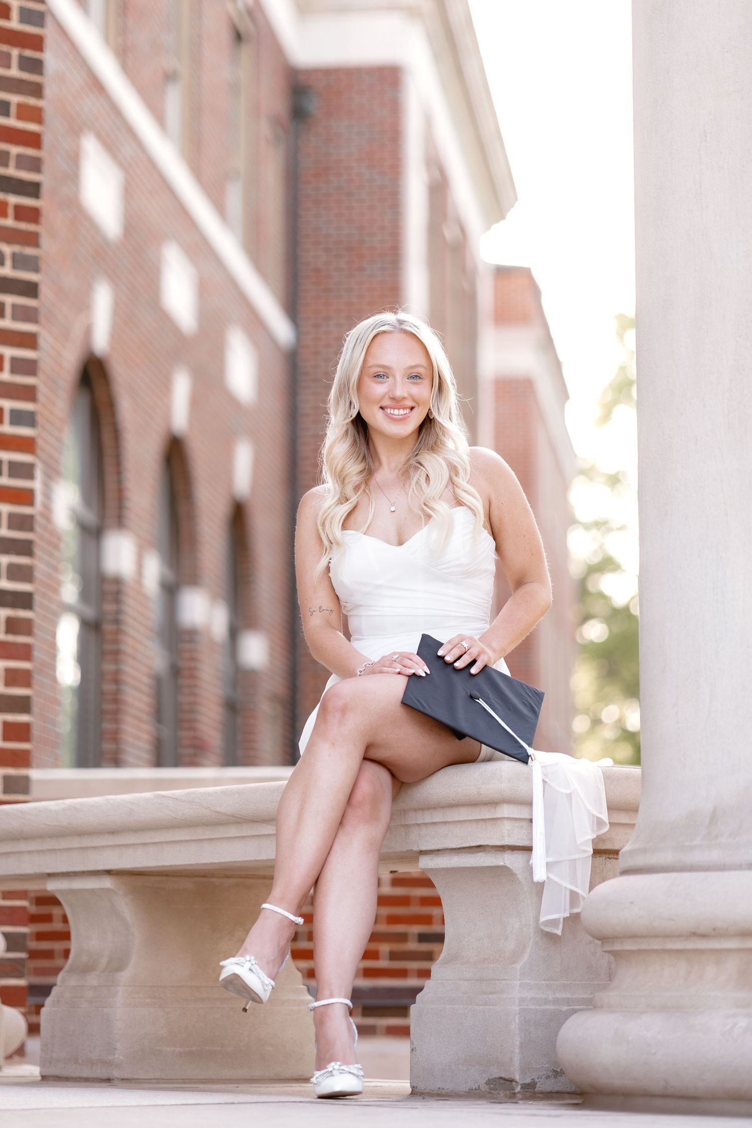 Series of casual portraits taken on stone steps near a brick building facade.