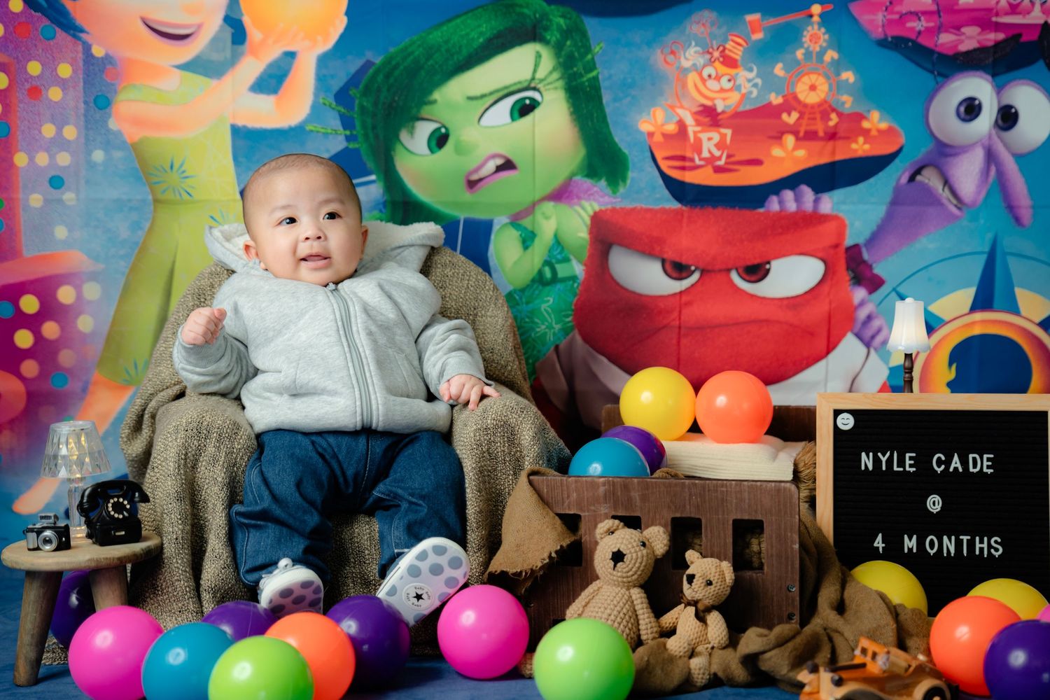 Vibrant carnival themed setup with colorful toys, balloons, and playful decorations.