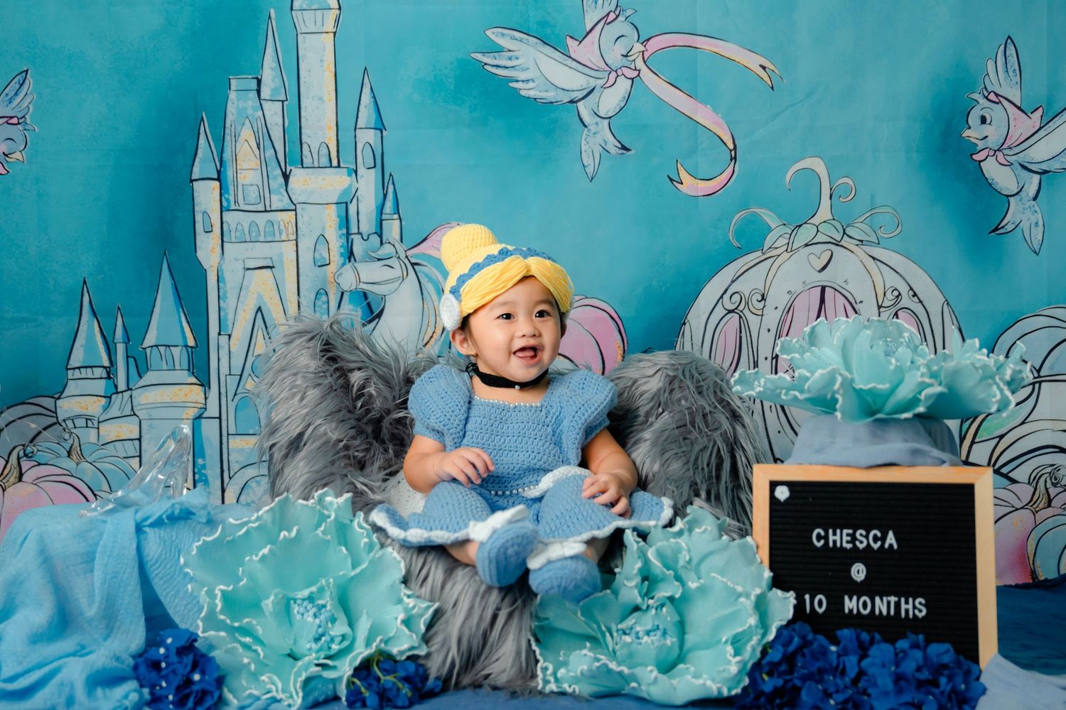Magical fairytale castle backdrop with blue watercolor design for milestone photos.