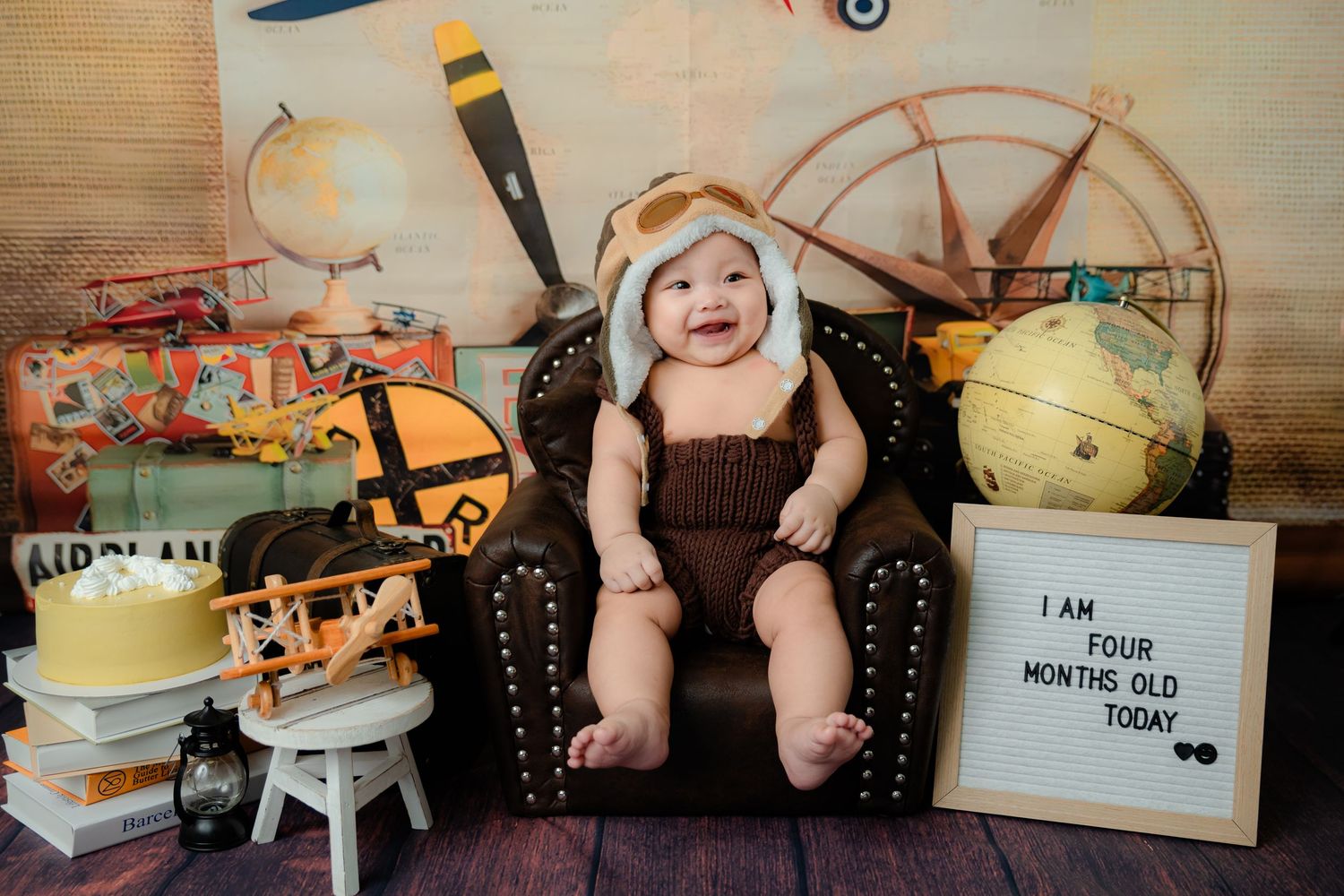 Vintage aviation themed photo setup with antique props and pilot accessories.
