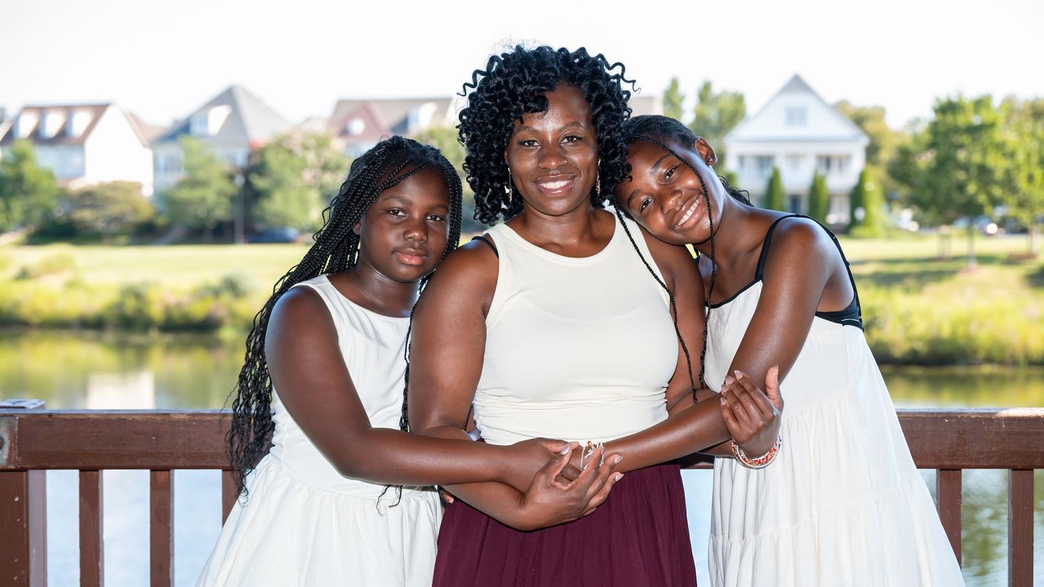 Mother with her two daughters during a family portrait session in Northern Virginia