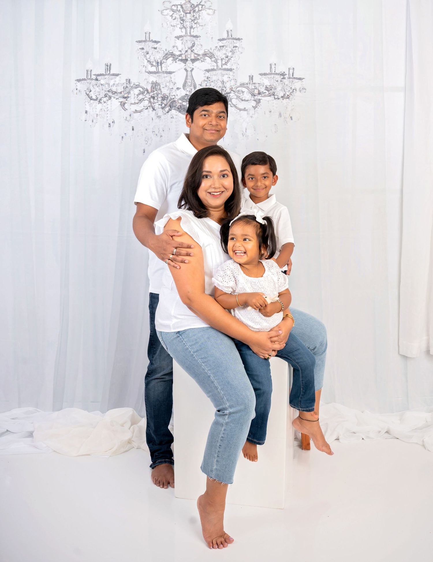 Styled studio portrait of a family (husband, wife, two kids) during a themed session by ek-framedmemories in Northern Virginia