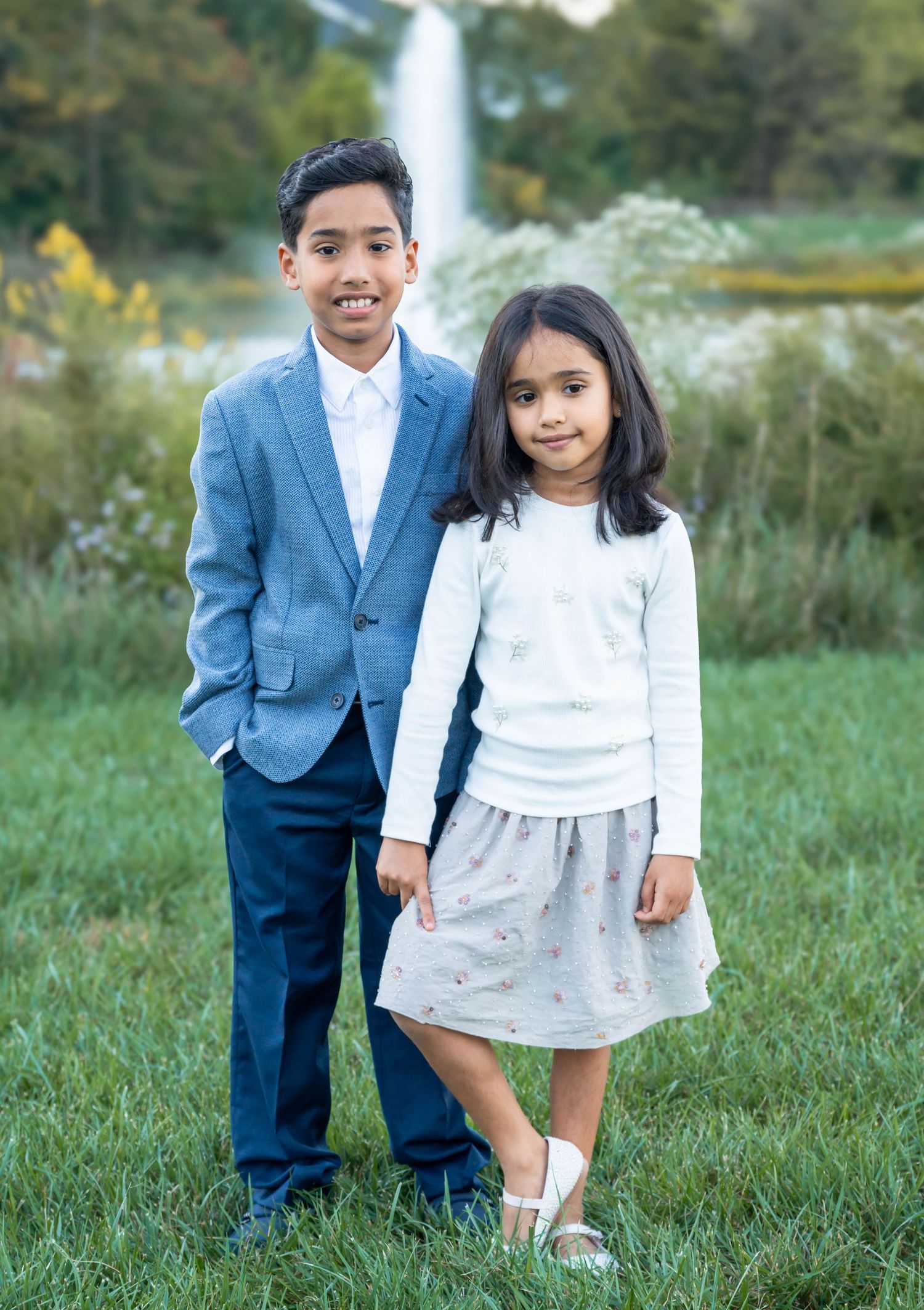 Outdoor portrait of two children captured in natural light by ek-framedmemories